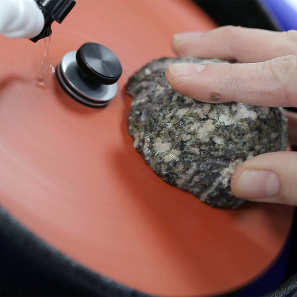 Sanding a Geode on the Hi-Tech Slant Cabber - SUVA Lapidary